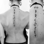 фото женской татуировки с рунами на спине